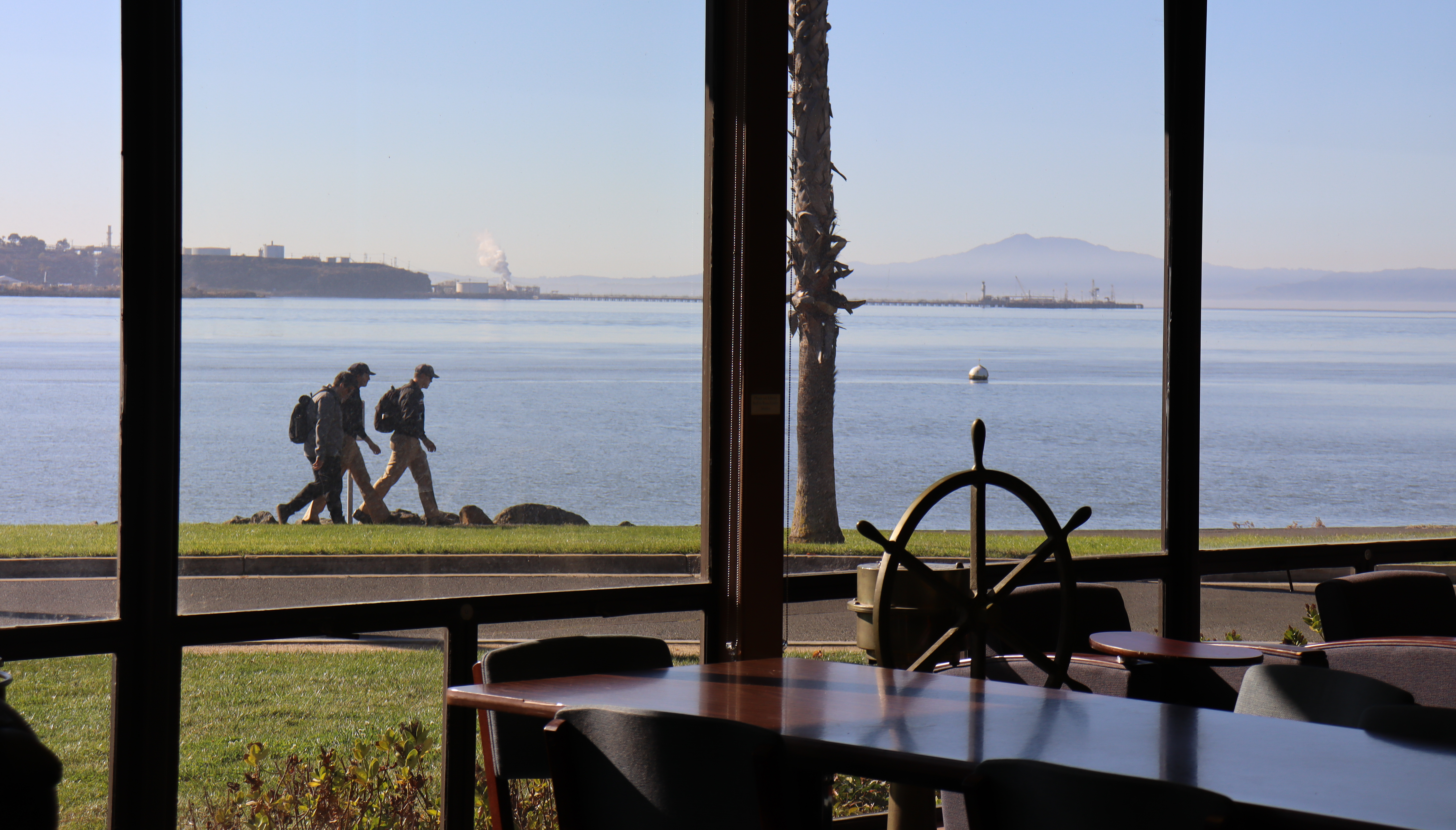 Students walk along waterfront